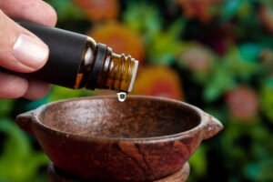 hands-pouring-essential-oil-2023-11-27-05-36-54-utc